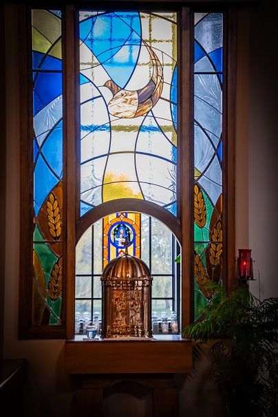 Tabernacle and stained glass window